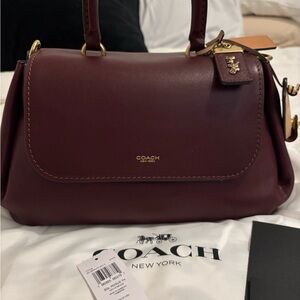 Coach slouchy rogue in Merlot